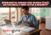 Spain Digital Nomad Visa Silence (PAS): Do You Really Need to File a Request? Man working on a laptop at a wooden desk with a coffee mug; calendar overlay and a banner about 'Spain Digital Nomad Visa Silence (PAS)' atop, with the SpainGuru logo.